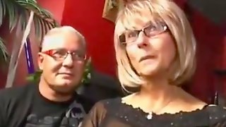 Older couples engage in a hot swinger..