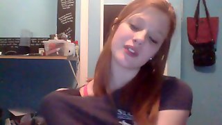 Cute redhead amateur teen strips and cums